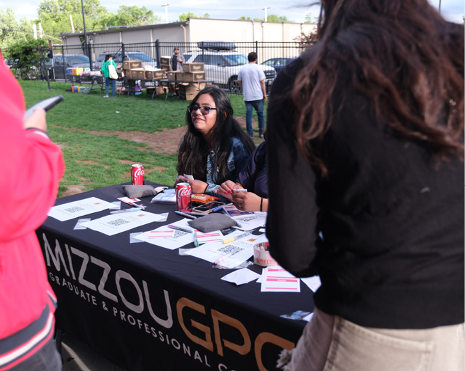GPC student at table.